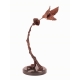 Colibri butinant une fleur en bronze