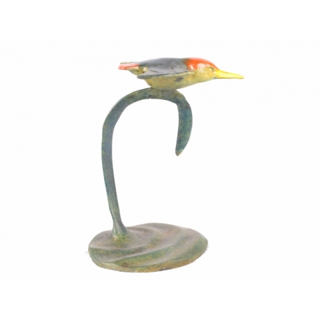 A kingfisher in flight, in polychrome bronze