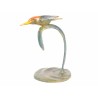 A kingfisher in flight, in polychrome bronze