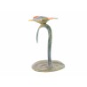 A kingfisher in flight, in polychrome bronze