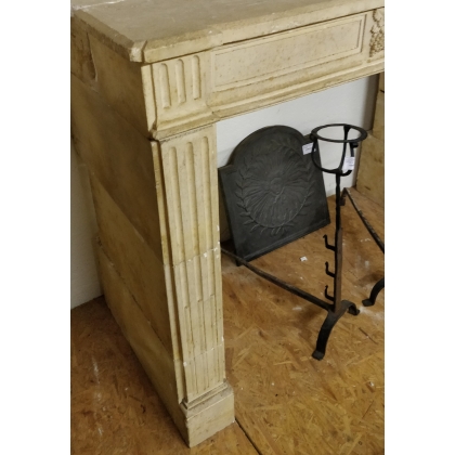 Louis XVI-style stone fireplace at  Moinat SA  - Antiques and home décor