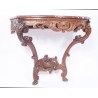 A pair of Regency-style side tables in carved oak