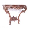 A pair of Regency-style side tables in carved oak