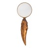 Gold-trimmed magnifying glass