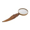 Gold-trimmed magnifying glass