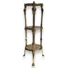 Round table with three polished brass tiers