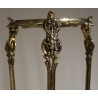 Round table with three polished brass tiers