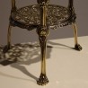 Round table with three polished brass tiers