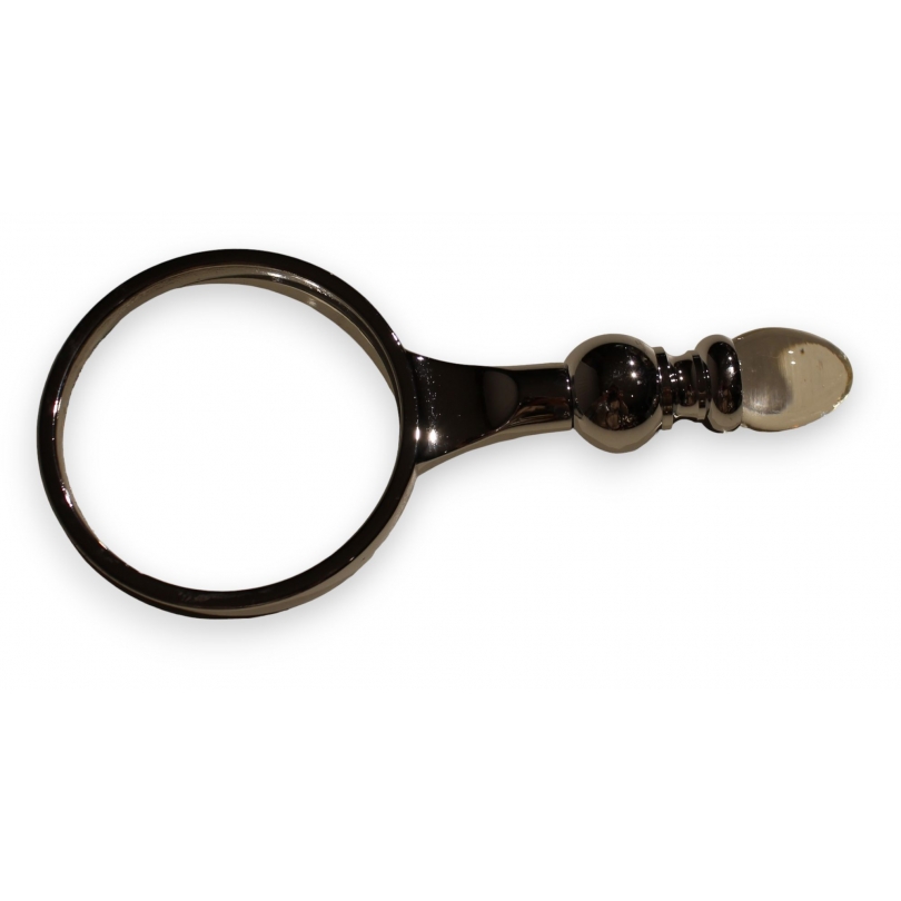 Chrome-plated brass magnifying glass with a glass lens