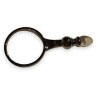 Chrome-plated brass magnifying glass with a glass lens