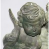 Pair of bronze putti on marble plinths