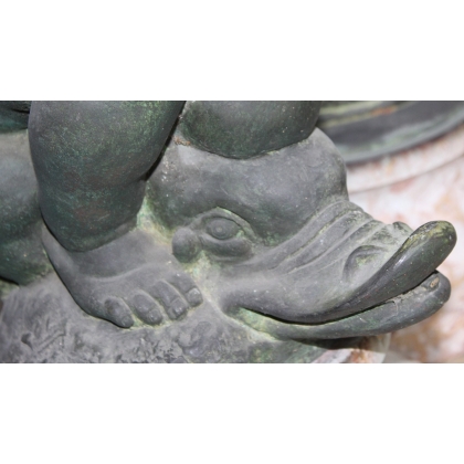 Pair of bronze putti on marble plinths