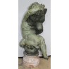 Pair of bronze putti on marble plinths