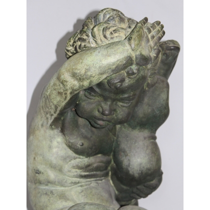Pair of bronze putti on marble plinths