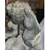 Pair of bronze putti on marble plinths