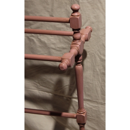 Pink-lacquered turned wooden clothes rack
