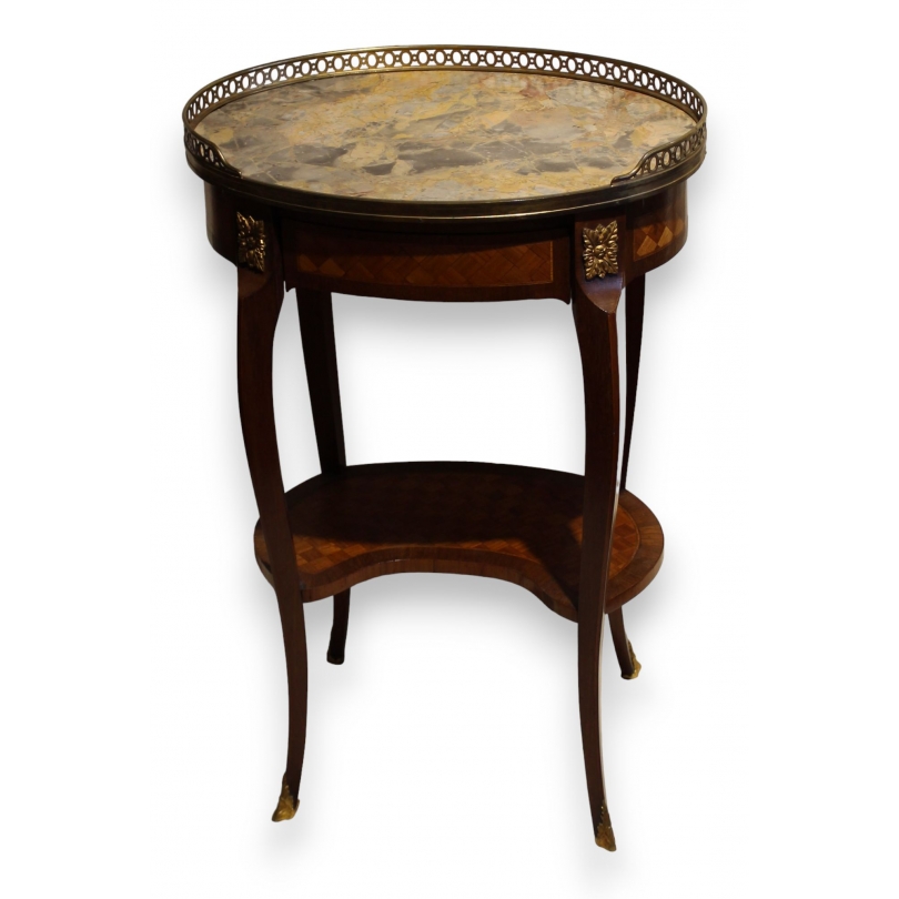 Oval Transition-style side table with a marble top