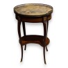 Oval Transition-style side table with a marble top