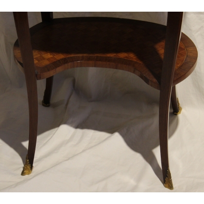 Oval Transition-style side table with a marble top