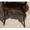 Oval Transition-style side table with a marble top