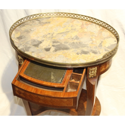 Oval Transition-style side table with a marble top