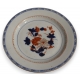 Assiette en porcelaine décor fleurs bleu et orange