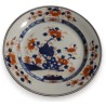 Assiette en porcelaine décor arbuste