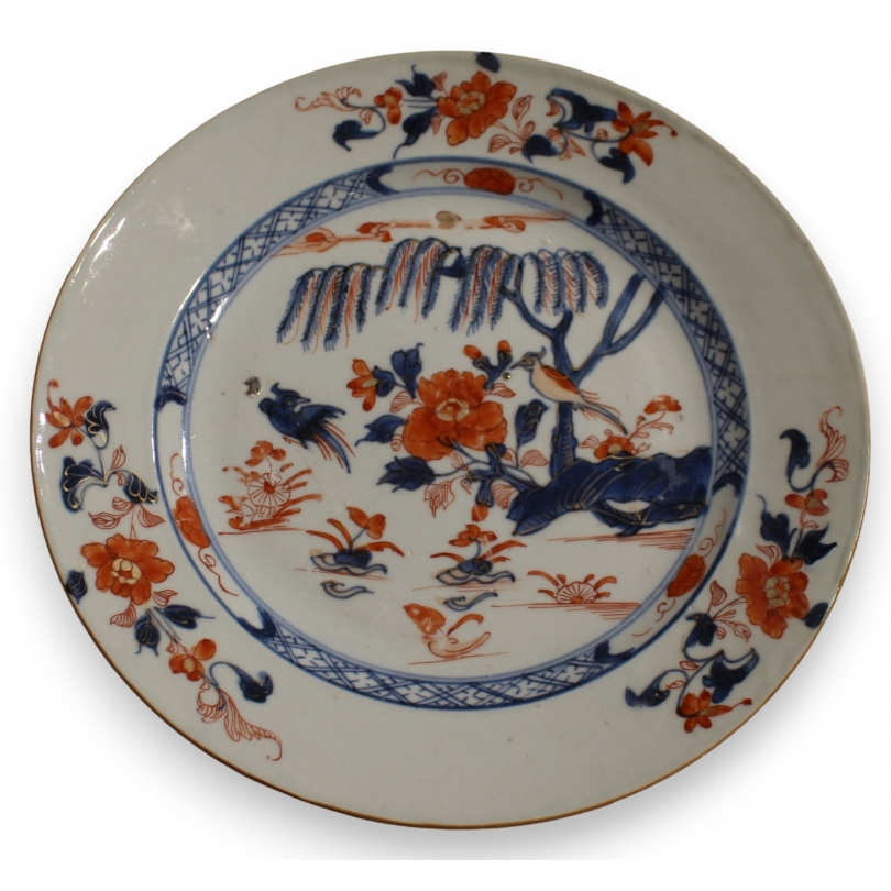 Assiette en porcelaine décor arbuste