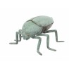 Bronze beetle with a green patina, shaped like a box