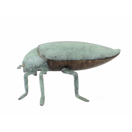 Bronze beetle with a green patina, shaped like a box