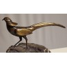 Faisan en bronze sur une pierre, signé REUSSNER