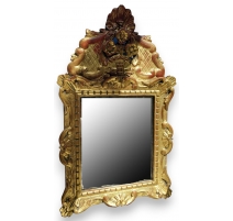 Miroir en bois sculpté doré style Régence