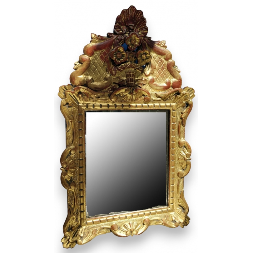Miroir en bois sculpté doré style Régence