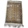 Silk rugs, geometric patterns and flowers
