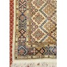 Silk rugs, geometric patterns and flowers