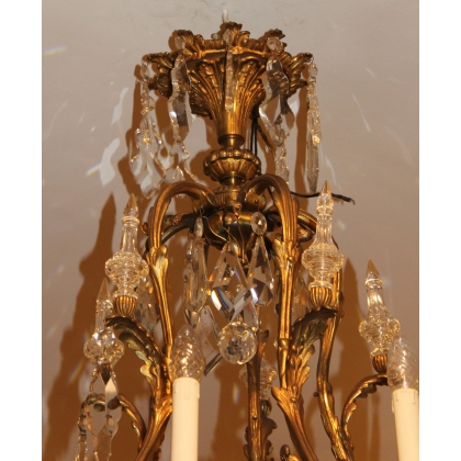 Grand lustre style Louis XV en bronze doré
