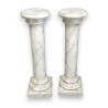 Paire de colonnes en faux marbre blanc