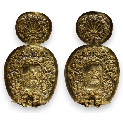 A pair of brass wall lights by HELLSTRÖM NYKÖPING