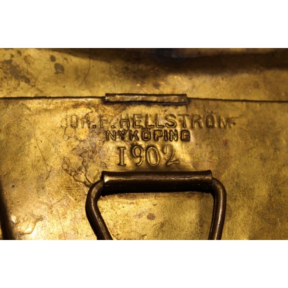 A pair of brass wall lights by HELLSTRÖM NYKÖPING