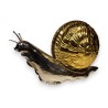 A snail made of chrome-plated and polished brass, shaped like a box
