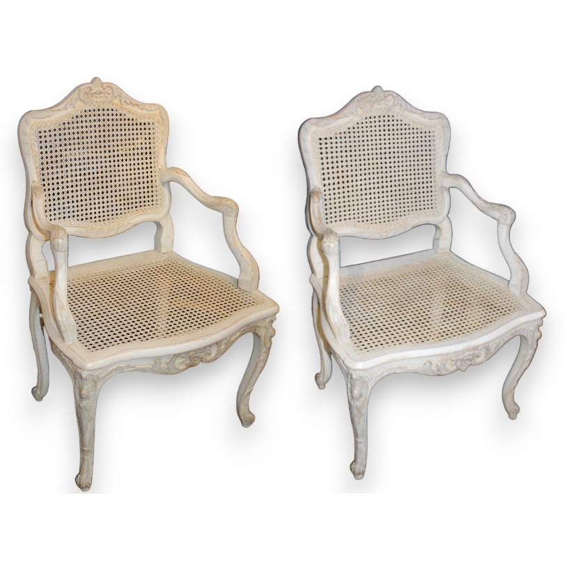 A pair of lacquered and cane-seated Regency armchairs. From  Moinat SA  - Antiques and home décor