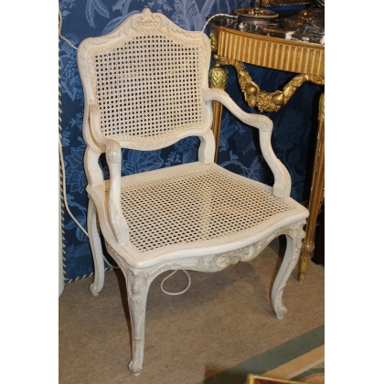 A pair of lacquered and cane-seated Regency armchairs. From  Moinat SA  - Antiques and home décor