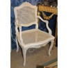 A pair of lacquered and cane-seated Regency armchairs. From  Moinat SA  - Antiques and home décor