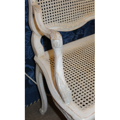 A pair of lacquered and cane-seated Regency armchairs. From  Moinat SA  - Antiques and home décor
