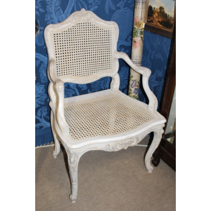 A pair of lacquered and cane-seated Regency armchairs. From  Moinat SA  - Antiques and home décor