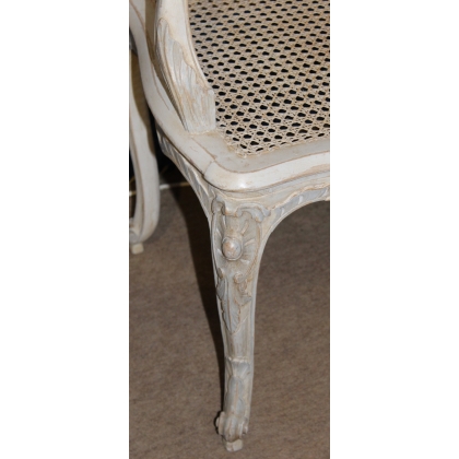A pair of lacquered and cane-seated Regency armchairs. From  Moinat SA  - Antiques and home décor