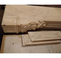 Cheminée style Louis XVI en marbre blanc