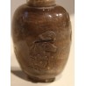 Brown glass snuff bottle with an engraved ‘Dogs’ design