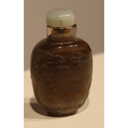 Brown glass snuff bottle with an engraved ‘Dogs’ design