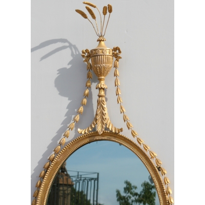  Miroir Hepelwhite ovale. sur  Moinat SA  - Antiquités décoration